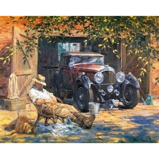 Man sitting near his car