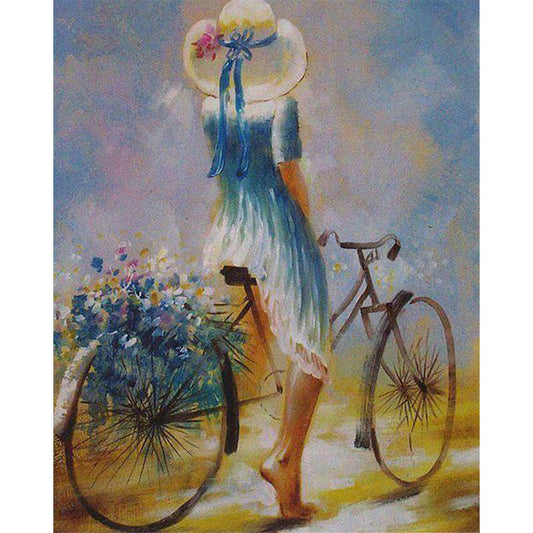 Young woman on a bicycle