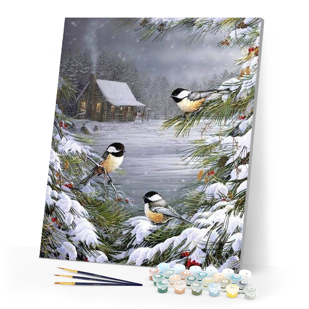 Drei Vögel im Schnee