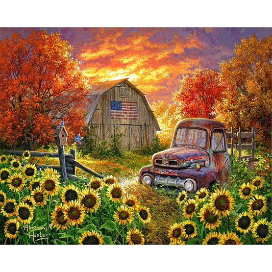 Sunflowers in front of the barn