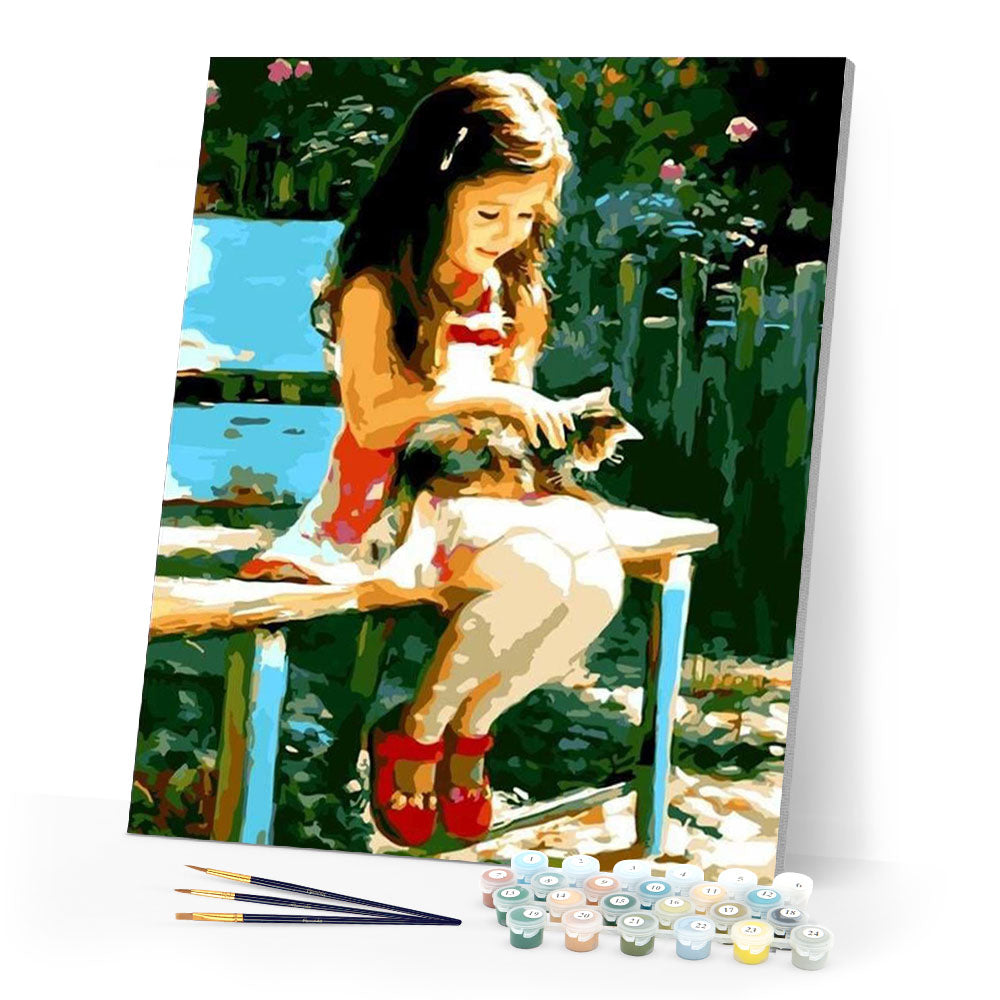 Little Girl in the park with her cat