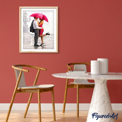 Man and woman with red umbrella