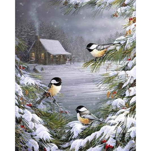 Drei Vögel im Schnee