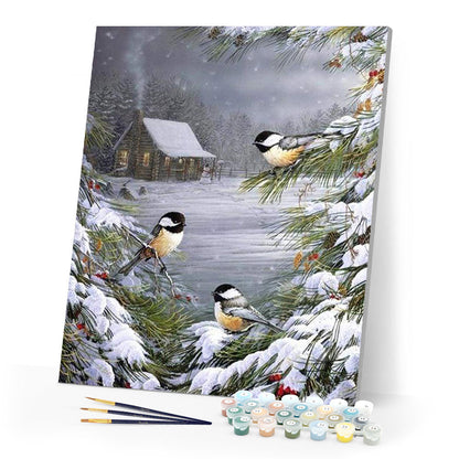 Drei Vögel im Schnee